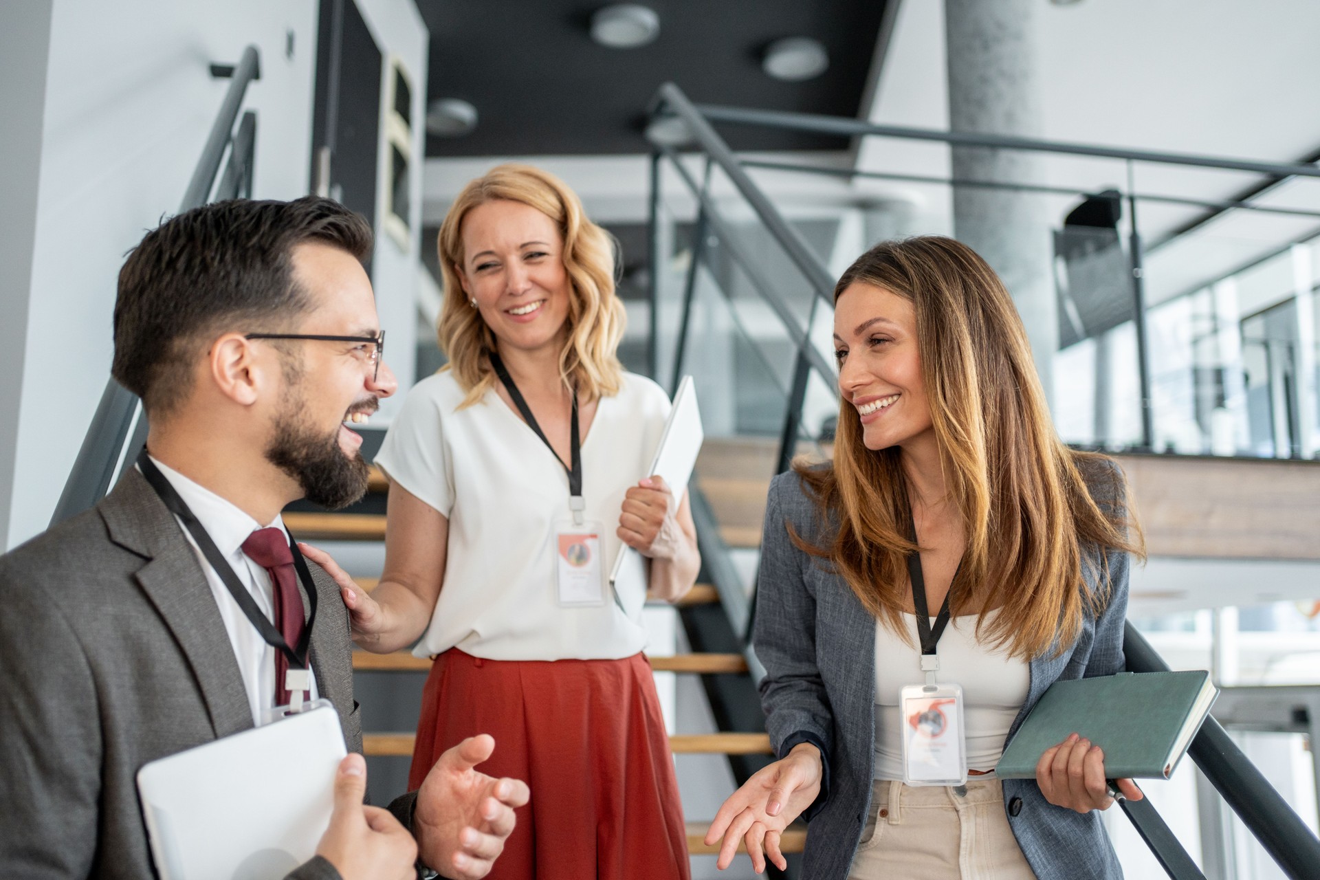 Businesspeople talking during conference break